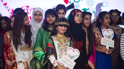 Children dressed in their countries’ national dress at the launch of the I Love UAE initiative, hosted under the patronage of Sheikh Saif bin Zayed, at the Ritz Carlton hotel in Abu Dhabi on Sunday. The campaign leads up to the 45th UAE National Day. Christopher Pike / The National