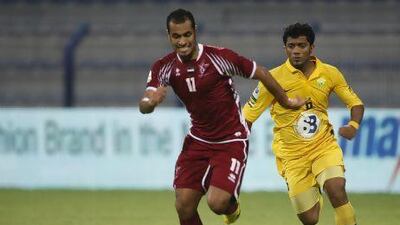 Liverpool’s Luis Suarez takes the ball away from Zenit Saint Petersburg’s Tomas Hubocan last night.