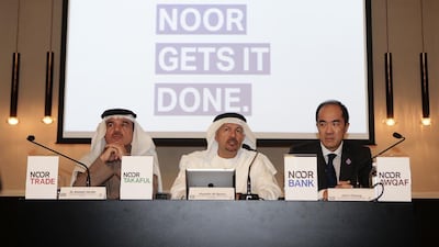Ahmed Janahi, deputy group CEO of Noor Investment Group, Hussain Al Qemzi, CEO of Noor Bank, speak at a press conference announcing the company's rebranding. Sarah Dea / The National