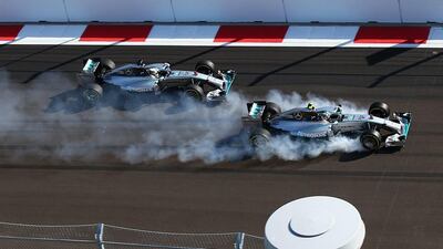 Nico Rosberg of Mercedes locks up approaching Turn 2 next to teammate Lewis Hamilton during the Russian Grand Prix on Sunday. He recovered to finish second. Paul Gilham / Getty Images