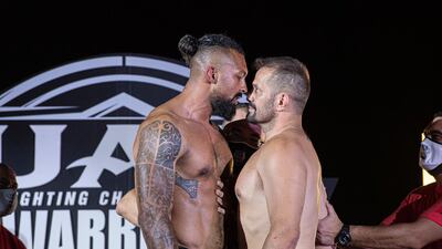 Chi Lewis-Parry, left, and Fabio Maldonado face off after the weigh-in ahead of Friday’s UAE Warriors 13 in Dubai. Courtesy UAE Warriors.