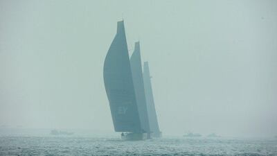 The Volvo Ocean Race boats are seen at the start to Leg 3 on Saturday in foggy Abu Dhabi. Photo Courtesy / Volvo Ocean Race / Getty Images