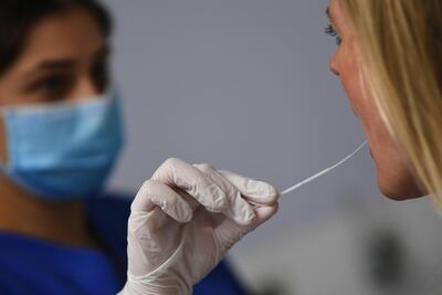 A patient undergoes a Covid-19 swab test. Bloomberg