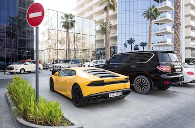 The Lamborghini is parked outside the Five hotel on the Palm. Leslie Pableo for The National