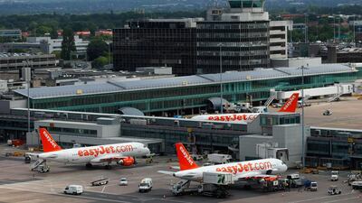 Armed police have evacuated Manchester Airports over concerns about a suspicious package. Paul Thomas / Bloomberg