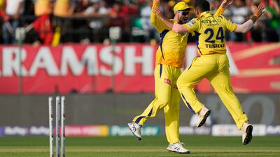 Chennai Super Kings' Tushar Deshpande and teammate Sameer Rizvi celebrate the wicket of Punjab Kings batter Rilee Rossouw who was out for a duck. AP