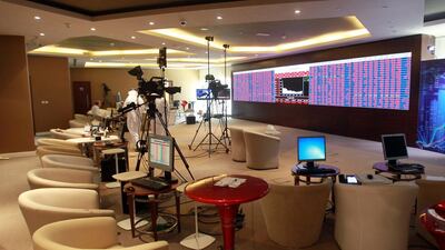 Above, stock information are seen at Qatar Stock Exchange in Doha. Reuters