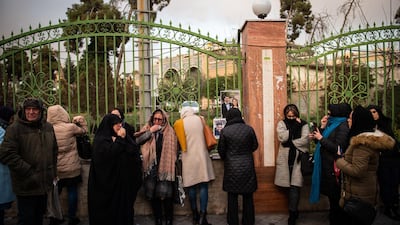 Demonstrators gather during a vigil for the victims of the Ukraine International Airlines flight that was shot down by Iran, in Tehran, Iran. Bloomberg