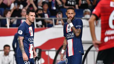 Lionel Messi (L) and Brazilian forward Neymar (R) chat before a free kick. AFP