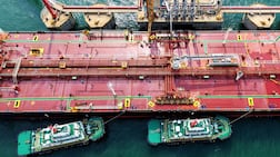 A crude oil tanker unloads at the oil terminal of the port in Qingdao, in China’s eastern Shandong province on April 28, 2026. (Photo by CN-STR / AFP) / China OUT