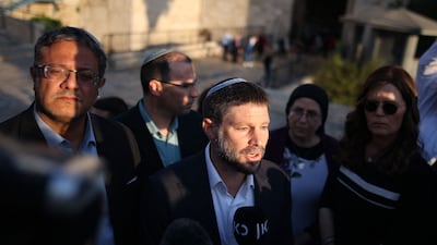 Israeli Finance Minister Bezalel Smotrich speaks to a journalist in Jerusalem in October 2021. AFP