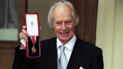 George Martin in 1996 at Buckingham Palace in London where he had just been knighted by Queen Elizabeth. Neil Munns / PA through AP
