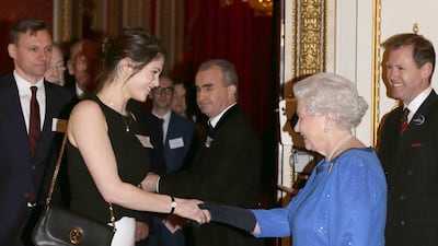 The queen with actress Gemma Arterton at Buckingham Palace. Getty