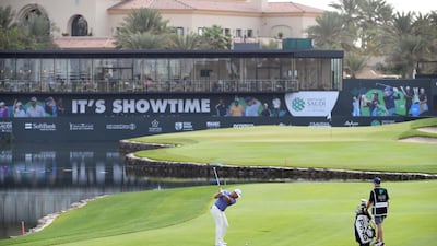 England's Lee Westwood of England plays his third shot on the 18th hole on his way to an opening round 67. Getty