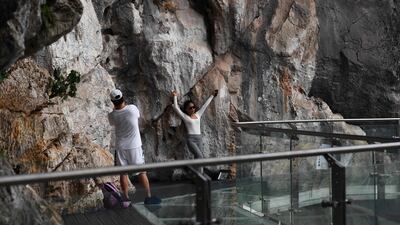 Visitors capture their experiences of the bridge.