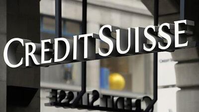 Credit Suisse will acquire Morgan Stanley's regional wealth management business. Steffen Schmidt / AP Photo