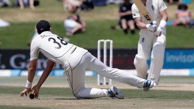 New Zealand's Tim Southee stops a shot from England batsman Joe Denly. AP