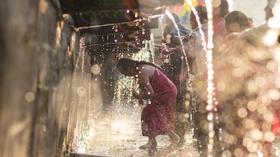 Hindus bathe as part of the full moon festival Balaju Purnima, in Kathmandu, Nepal. EPA