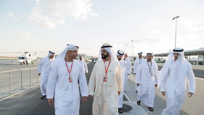 Sheikh Hazza bin Zayed, Vice Chairman of the Abu Dhabi Executive Council (L), Sheikh Mohammed bin Rashid and Sheikh Hamdan, attend the final day of the 2017 Formula 1 Etihad Airways Abu Dhabi Grand Prix, in Shams Tower. Saeed Al Neyadi / Crown Prince Court - Abu Dhabi