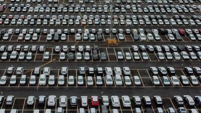 New cars in a compound in Sheerness in Kent, south east England. Sales stalled at 113,781 cars in November, with 42,840 fewer vehicles joining Britain's roads. AFP