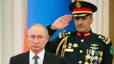 Mr. Putin attends the official welcome ceremony during his meeting with King Salman in Riyadh. AP Photo