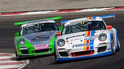 Prince Abdulaziz Al Faisal, left, in action during last season's Porsche GT3 Cup Challenge Middle East last year. The driver from Saudi Arabia is hoping to retain his title when the new season starts in November.