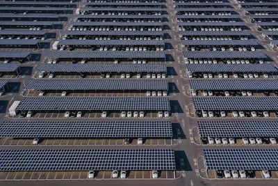 An aerial photo shows newly produced cars at a BMW factory in Shenyang, China. AFP