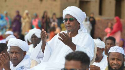 Sudanese worshippers who fled violence in Khartoum, gather for Eid Al Adha morning prayers in the region of Jazira, south of Khartoum. AFP