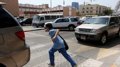 The first day of the term in Abu Dhabi on Sunday was about the buzz of school than trouble with the traffic. Christopher Pike / The National