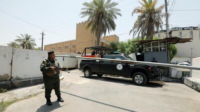 Iraqi security forces stand guard outside the Bahraini embassy in Baghdad, Iraq. Reuters