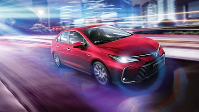 The Corolla in city lights.