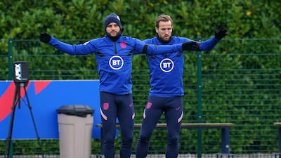 England's Kyle Walker, left, and Harry Kane during a training session in London on the eve of their World Cup qualifier against San Marino. PA