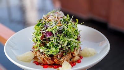 This towering crispy duck salad is one of global restaurant brand Hakkasan's signature dishes - and with good reason, it's absolutely delicious. Victor Besa / The National