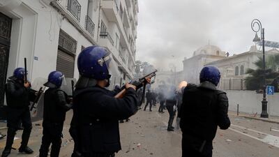 Anti-riot police clash with people protesting against President Abdelaziz Bouteflika, in Algiers, Algeria. Reuters