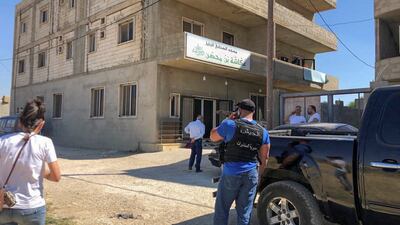 People gather near the mosque where the shooting took place. Reuters