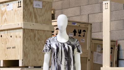 Martin Margiela, spring / summer 1996: A blue-tone satinated dress with photographic print of a 1960s dress lining. Photo: Sotheby's