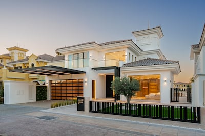 Villa Opus comes with a showroom-style garage. Photo: haus & haus