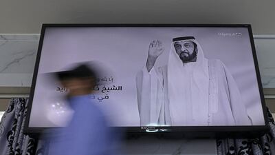 A local channel displays the portrait of late Sheikh Khalifa in Abu Dhabi. AFP