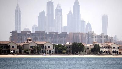 The view of Dubai Marina and Palm Jumeirah from the Sofitel The Palm hotel at the Palm Jumeirah in Dubai. The rise in Dubai property prices is unsustainable according to Jones Lang LaSalle. Silvia Razgova / The National