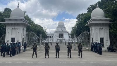 Armed Bangladeshi soldiers stand guard outside the Supreme Court in Dhaka, Bangladesh. EPA
