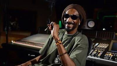 Snoop Lion has converted to Rastafarianism and claims to be Bob Marley reincarnated. Jordan Strauss / Invision / AP Photo