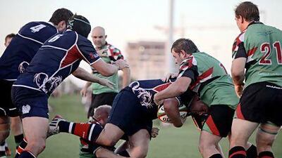 The Jebel Ali Dragons, in blue, squared off in the West Asia Cup final with the Dragons grabbing final bragging rights and the UAE rugby triple crown with their third piece of silverware this season.