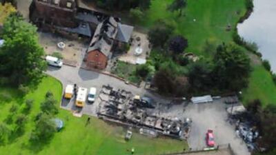 An aerial view of the the burned-out mansion in Maesbrook, England.