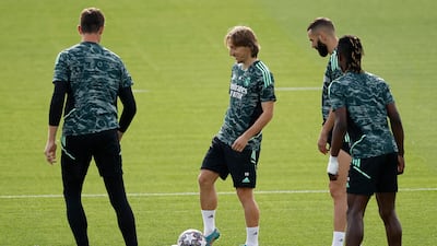 Real Madrid's Luka Modric, Karim Benzema and Eduardo Camavinga during training. Reuters