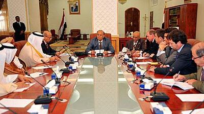 Yemen’s vice president, Abdrabu Mansur Hadi, centre, who is the acting leader, meets with Arab and western ambassadors in Sanaa yesterday. The outgoing president, Ali Abdullah Saleh, apologised for “any shortcoming” in his 33-year rule before leaving Yemen for the US on Sunday.