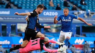 Richarlison battles for the ball with Crystal Palace goalkeeper Vicente Guaita. EPA