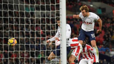 Tottenham striker Harry Kane heads in his first goal against Stoke City at Wembley. Toby Melville / Reuters