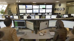 Technicians monitor data flow in the control room of an internet service provider in Tehran. Reuters