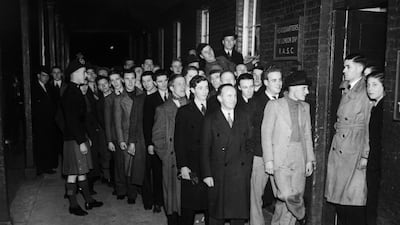 Men queuing outside the headquarters of the Royal Army Service Corps to join up on the eve of conscription in 1939 at the start of World War II. All photos: Getty Images