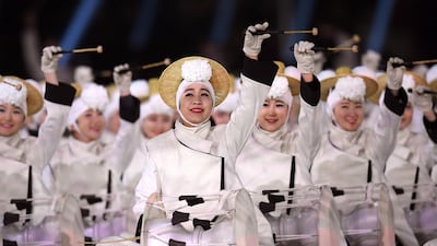 Performers entertain the crowd during the opening ceremony. Matthias Hangst / Getty Images